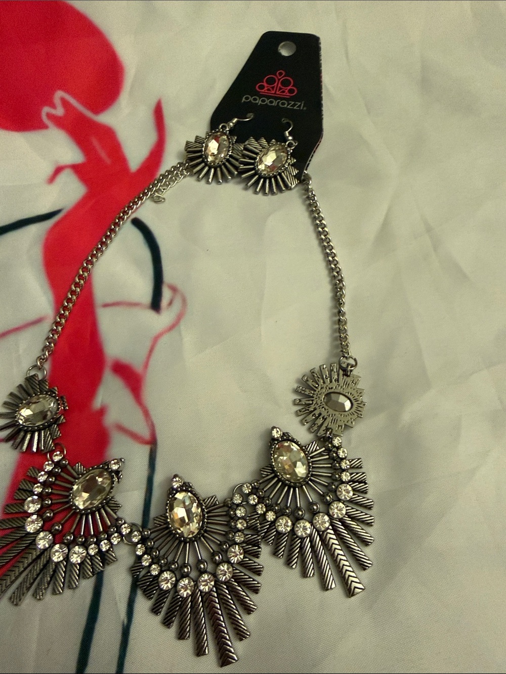 paparazzi Silver Sunburst Crystal Bib Necklace and Earring Set